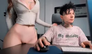 A young girl distracts a guy from the computer with her wet pussy