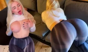 Busty blonde in tights hints at hot fun