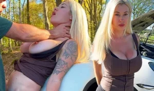 A blonde with big tits in nature near a car exposes her cap for sex
